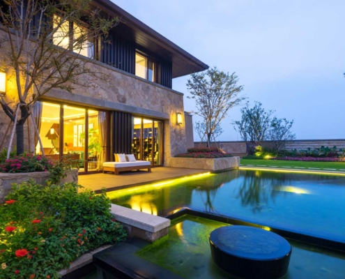 backyard pool at dusk