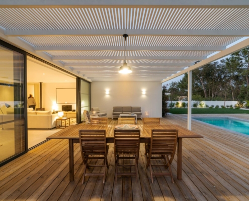 outdoor dining area and pool